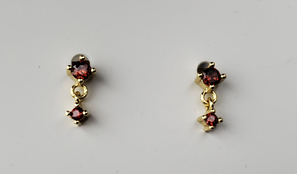 Tiny red earrings